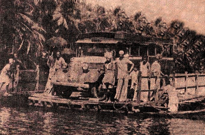 Bus on wooden ferry